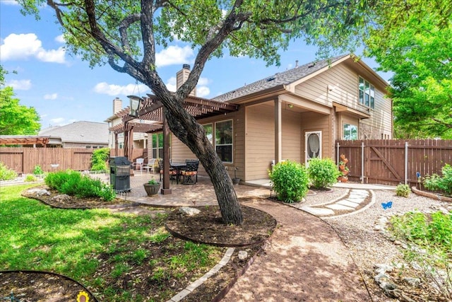 719 Walsh Hill Trl, Cedar Park, TX 78613 - back of house featuring a pergola, a fenced backyard, a patio, a gate, and a chimney