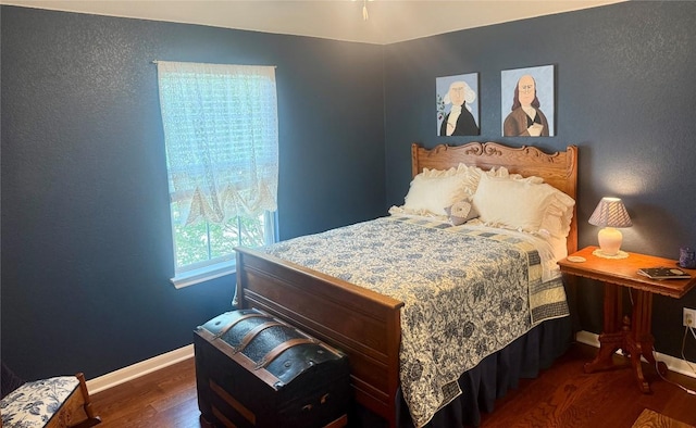 719 Walsh Hill Trl, Cedar Park, TX 78613 - bedroom featuring wood finished floors, baseboards, and a textured wall