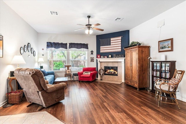 719 Walsh Hill Trl, Cedar Park, TX 78613 - living area featuring hardwood / wood-style floors, a ceiling fan, and a fireplace