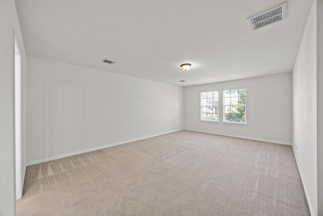 1444 Newbury St, Georgetown, TX 78626 - spare room featuring carpet floors and baseboards