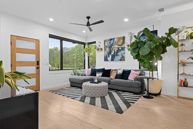6002 Ponca St Unit 1, Austin, TX 78741 - living room featuring wood-type flooring, a ceiling fan, and recessed lighting