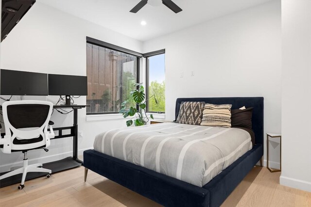 6002 Ponca St Unit 1, Austin, TX 78741 - bedroom with wood finished floors, recessed lighting, and ceiling fan