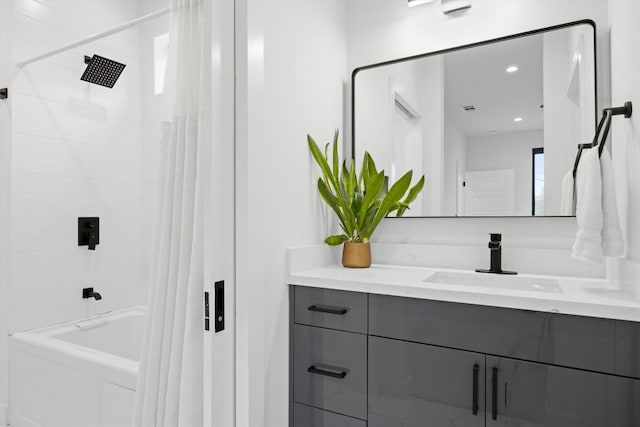 6002 Ponca St Unit 1, Austin, TX 78741 - bathroom with vanity and shower / bath combo with shower curtain
