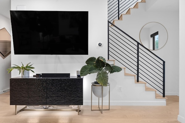 6002 Ponca St Unit 1, Austin, TX 78741 - stairs featuring wood finished floors and baseboards