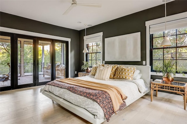 1004 Gaston Ave, Austin, TX 78703 - bedroom with french doors, access to exterior, wood finished floors, and ceiling fan