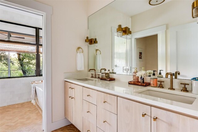 1004 Gaston Ave, Austin, TX 78703 - bathroom with double vanity and a garden tub