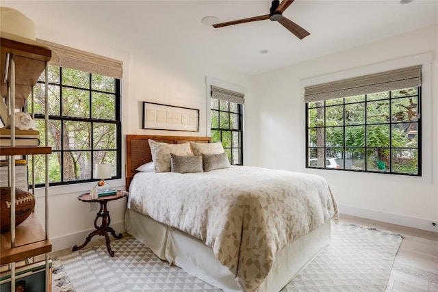 1004 Gaston Ave, Austin, TX 78703 - bedroom with baseboards and light wood-style floors