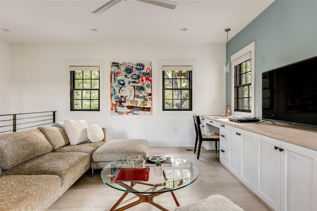 1004 Gaston Ave, Austin, TX 78703 - living room featuring plenty of natural light, ceiling fan, and light wood-style floors