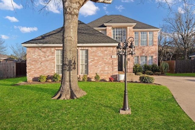1710 Greening Way, Leander, TX 78641 - traditional-style home with brick siding and roof with shingles