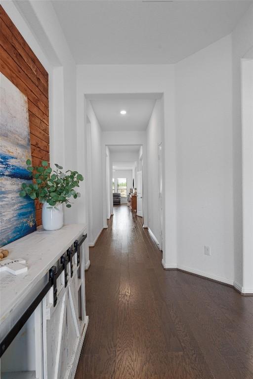 600 Spurlock Way, Liberty Hill, TX 78642 - corridor featuring dark wood-style floors and recessed lighting