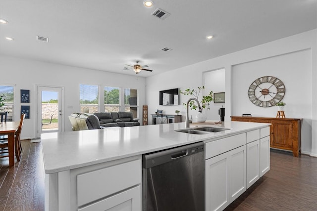 600 Spurlock Way, Liberty Hill, TX 78642 - kitchen with stainless steel dishwasher, dark wood finished floors, ceiling fan, white cabinetry, and recessed lighting
