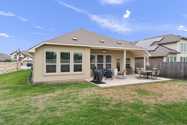 600 Spurlock Way, Liberty Hill, TX 78642 - back of property featuring a fenced backyard, a patio area, ceiling fan, stucco siding, and roof with shingles