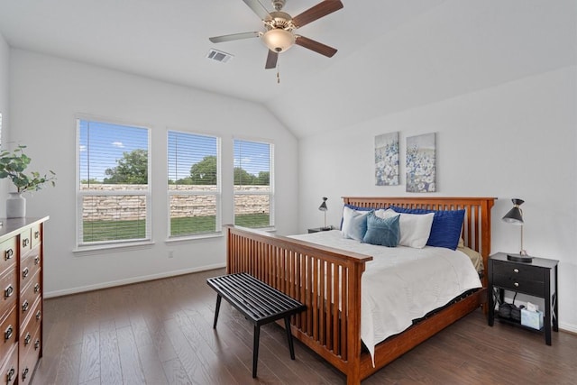 600 Spurlock Way, Liberty Hill, TX 78642 - bedroom featuring dark wood finished floors, vaulted ceiling, and a ceiling fan