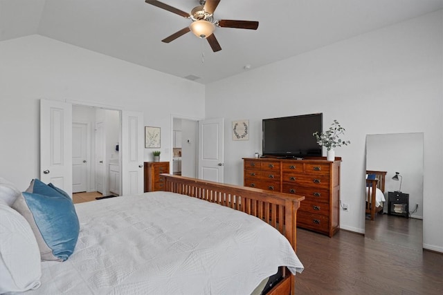 600 Spurlock Way, Liberty Hill, TX 78642 - bedroom with wood finished floors, lofted ceiling, and a ceiling fan