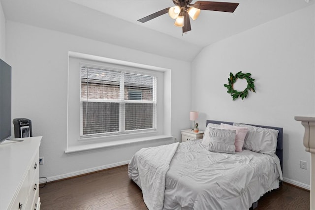 600 Spurlock Way, Liberty Hill, TX 78642 - bedroom with dark wood-type flooring, vaulted ceiling, and a ceiling fan
