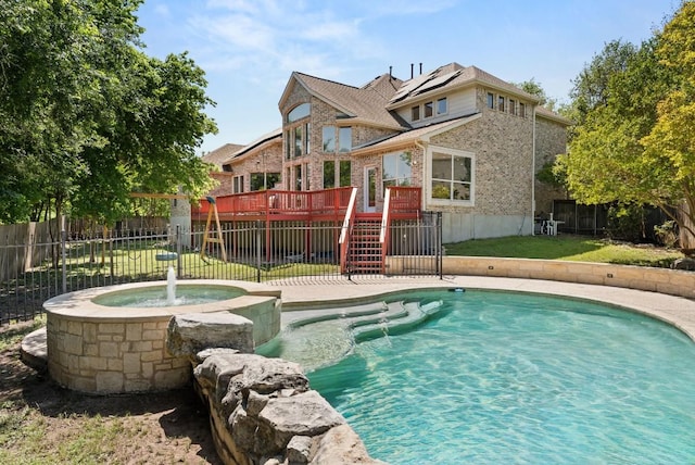view of pool featuring a yard, a fenced in pool, a fenced backyard, and a deck