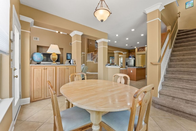 dining room featuring decorative columns, stairway, recessed lighting, and light tile patterned floors