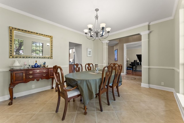 dining area with light tile patterned flooring, crown molding, ornate columns, and a notable chandelier