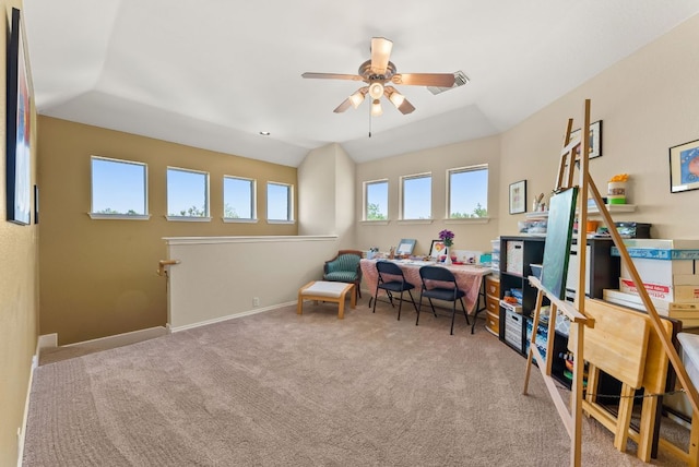 office space featuring ceiling fan, carpet floors, lofted ceiling, and baseboards
