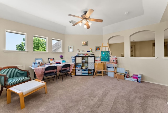 interior space featuring ceiling fan and visible vents