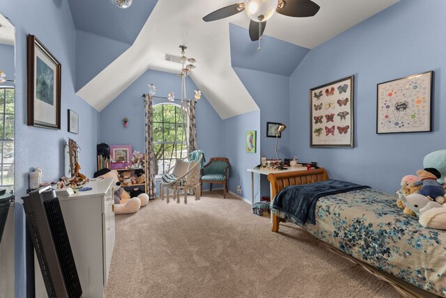 carpeted bedroom featuring lofted ceiling, visible vents, a ceiling fan, and baseboards