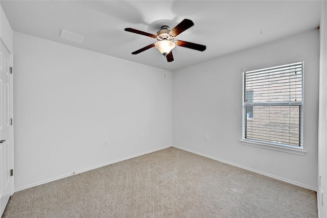 5705 Zachary Scott St, Austin, TX 78747 - unfurnished room featuring a ceiling fan, plenty of natural light, and carpet floors