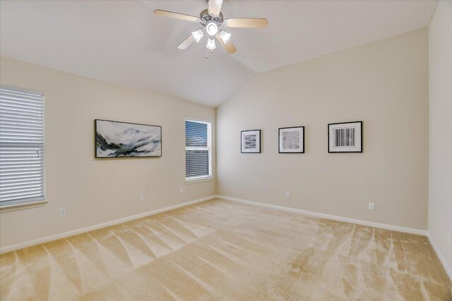 18301 Masi Loop, Pflugerville, TX 78660 - spare room with lofted ceiling, light carpet, ceiling fan, and baseboards