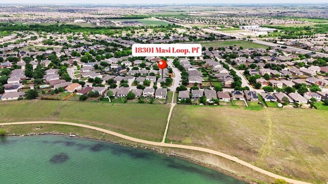 18301 Masi Loop, Pflugerville, TX 78660 - aerial view of property and surrounding area with a large body of water