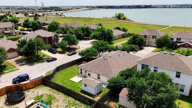 aerial view with a residential view and a water view