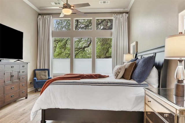 109 Perpetuation Dr, Austin, TX 78734 - bedroom featuring crown molding, light wood-style flooring, and ceiling fan