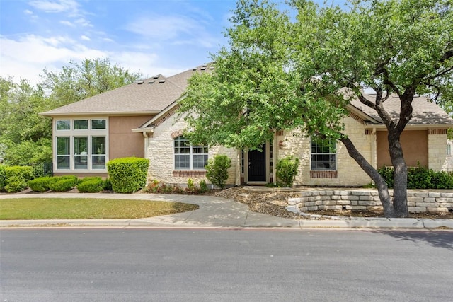 109 Perpetuation Dr, Austin, TX 78734 - view of front of property with stone siding