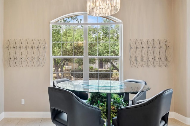 109 Perpetuation Dr, Austin, TX 78734 - tiled dining space with a chandelier and baseboards