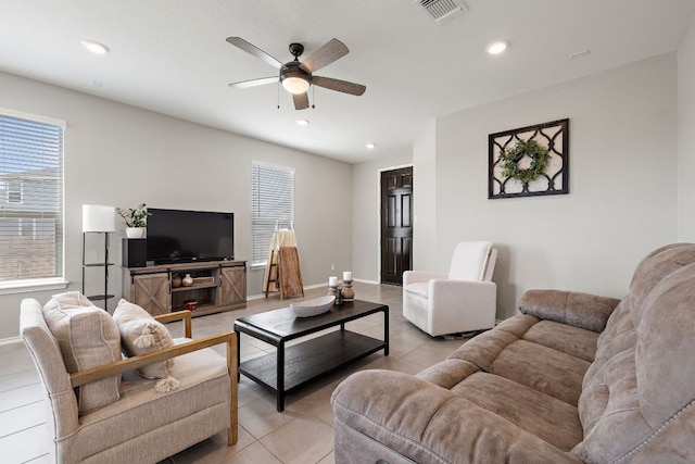 living area with recessed lighting, a ceiling fan, visible vents, and light tile patterned floors
