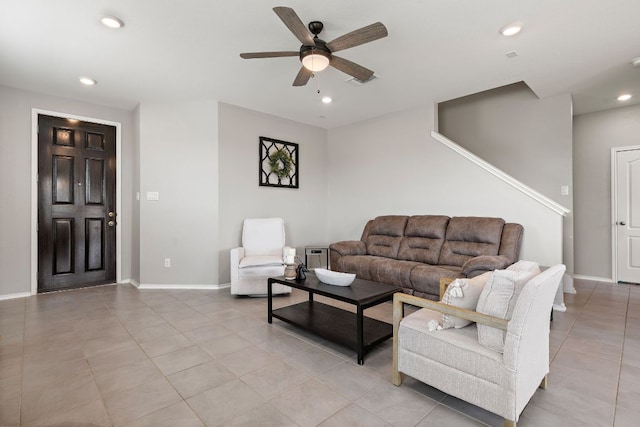 living area featuring a ceiling fan, light tile patterned floors, baseboards, visible vents, and recessed lighting