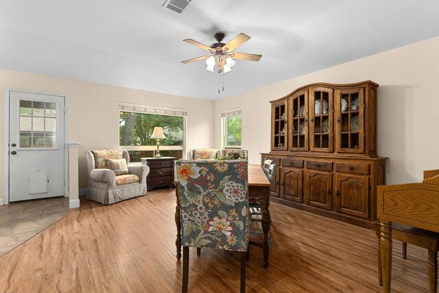 3325 Cantera Way, Round Rock, TX 78681 - dining space featuring a ceiling fan, wood finished floors, and baseboards