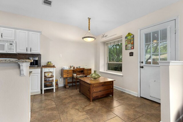 3325 Cantera Way, Round Rock, TX 78681 - dining room featuring baseboards