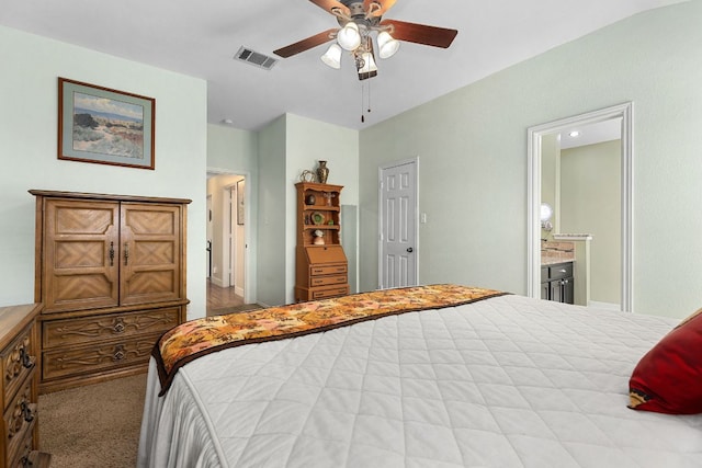 3325 Cantera Way, Round Rock, TX 78681 - bedroom featuring ensuite bath, a ceiling fan, and carpet flooring