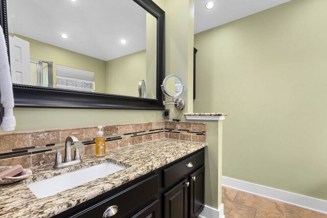 3325 Cantera Way, Round Rock, TX 78681 - full bath with baseboards, vanity, and recessed lighting