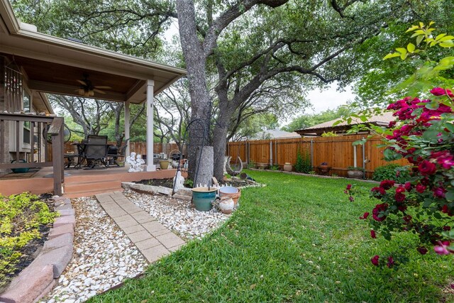 3325 Cantera Way, Round Rock, TX 78681 - view of yard with ceiling fan, a wooden deck, outdoor dining space, and a patio
