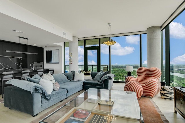 44 E Ave Unit 3906, Austin, TX 78701 - living room featuring a wall of windows and wood finished floors