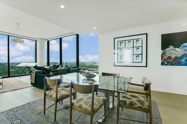 44 E Ave Unit 3906, Austin, TX 78701 - dining space featuring expansive windows, wood finished floors, and recessed lighting