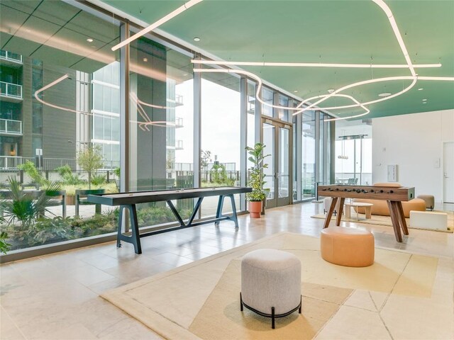 44 E Ave Unit 3906, Austin, TX 78701 - common area with a wall of windows and a high ceiling