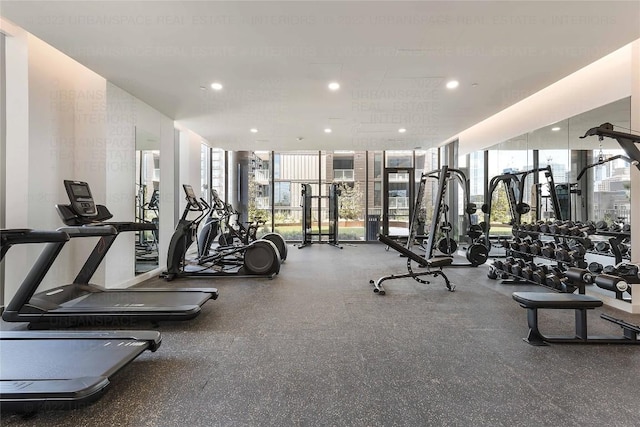 44 E Ave Unit 3906, Austin, TX 78701 - gym with expansive windows, healthy amount of natural light, and recessed lighting