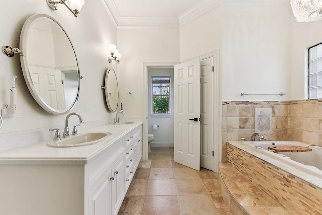 203 Saddle Blanket Dr, Dripping Springs, TX 78620 - bathroom with crown molding, double vanity, and a garden tub