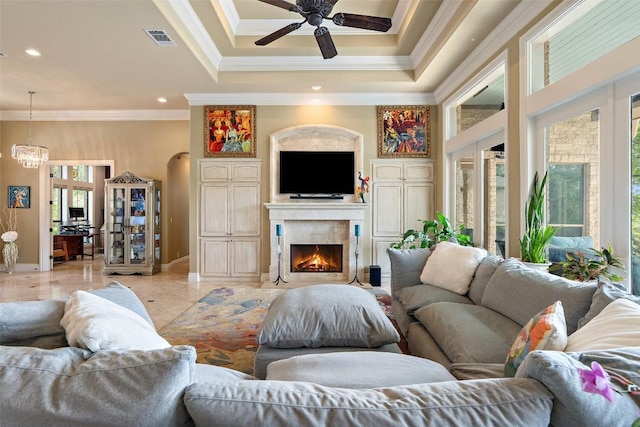 4616 High Gate Dr, Austin, TX 78730 - living room featuring ornamental molding, ceiling fan, a premium fireplace, a chandelier, and recessed lighting