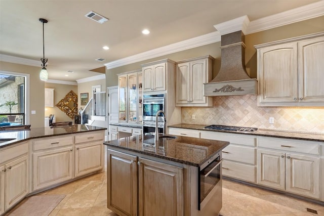 4616 High Gate Dr, Austin, TX 78730 - kitchen with stainless steel appliances, custom exhaust hood, backsplash, dark stone counters, and recessed lighting