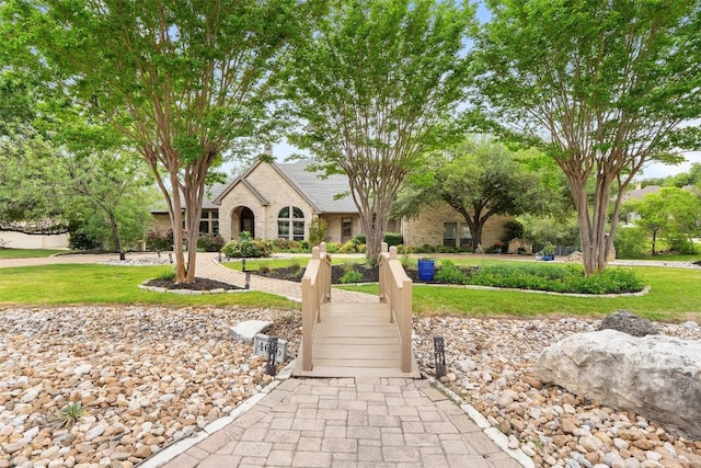4616 High Gate Dr, Austin, TX 78730 - view of front facade featuring a front yard and brick siding