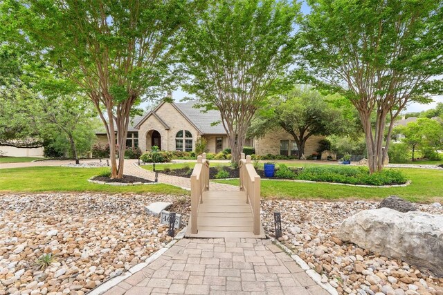4616 High Gate Dr, Austin, TX 78730 - view of front of property with a front yard and brick siding