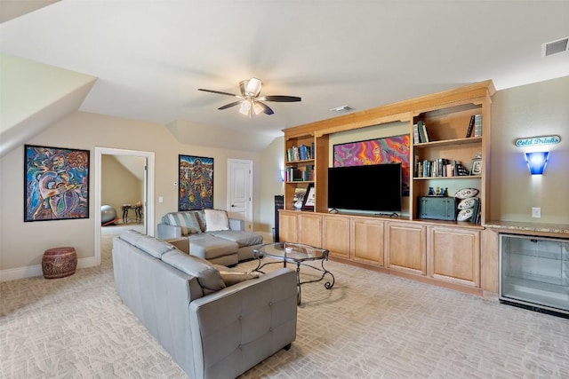 4616 High Gate Dr, Austin, TX 78730 - living area with wine cooler, a ceiling fan, lofted ceiling, and light carpet