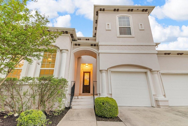 2601 Montebelluna Pl, Leander, TX 78641 - mediterranean / spanish house with stucco siding, concrete driveway, and an attached garage